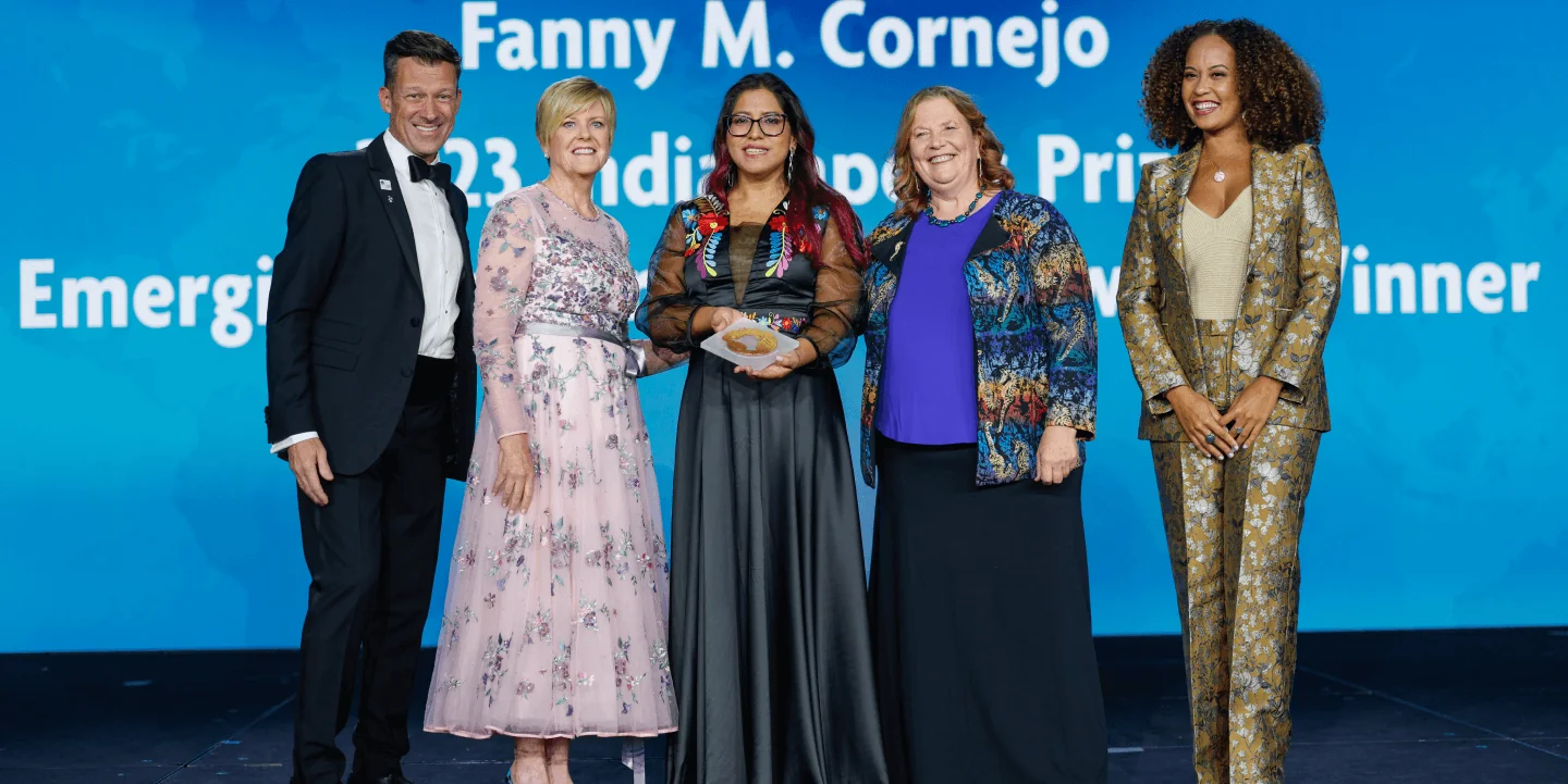 Fanny Cornejo Emerging Conservationist winner receiving award on stage