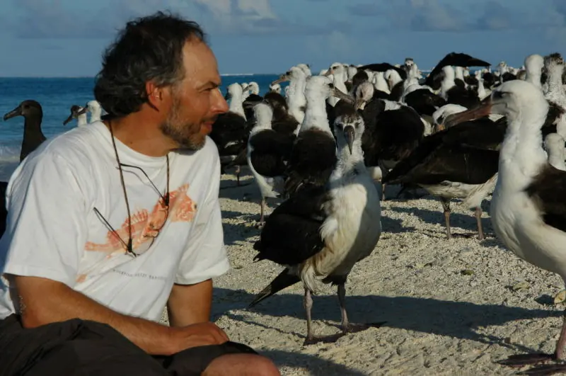 Carl Safina with birds