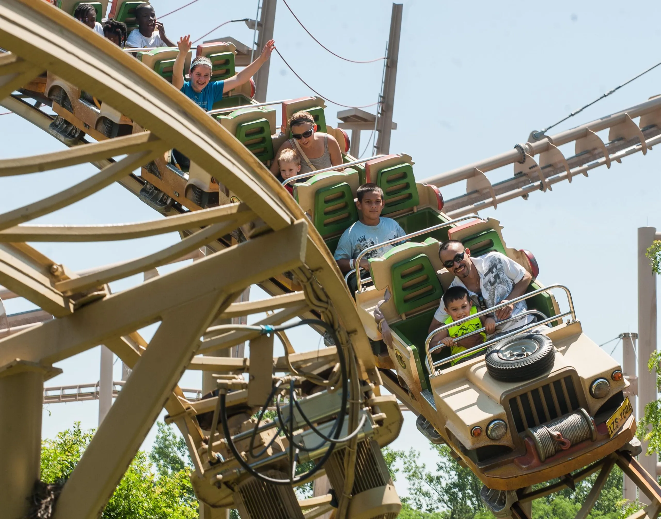 people riding the rollercoaster at the Indianapolis Zoo