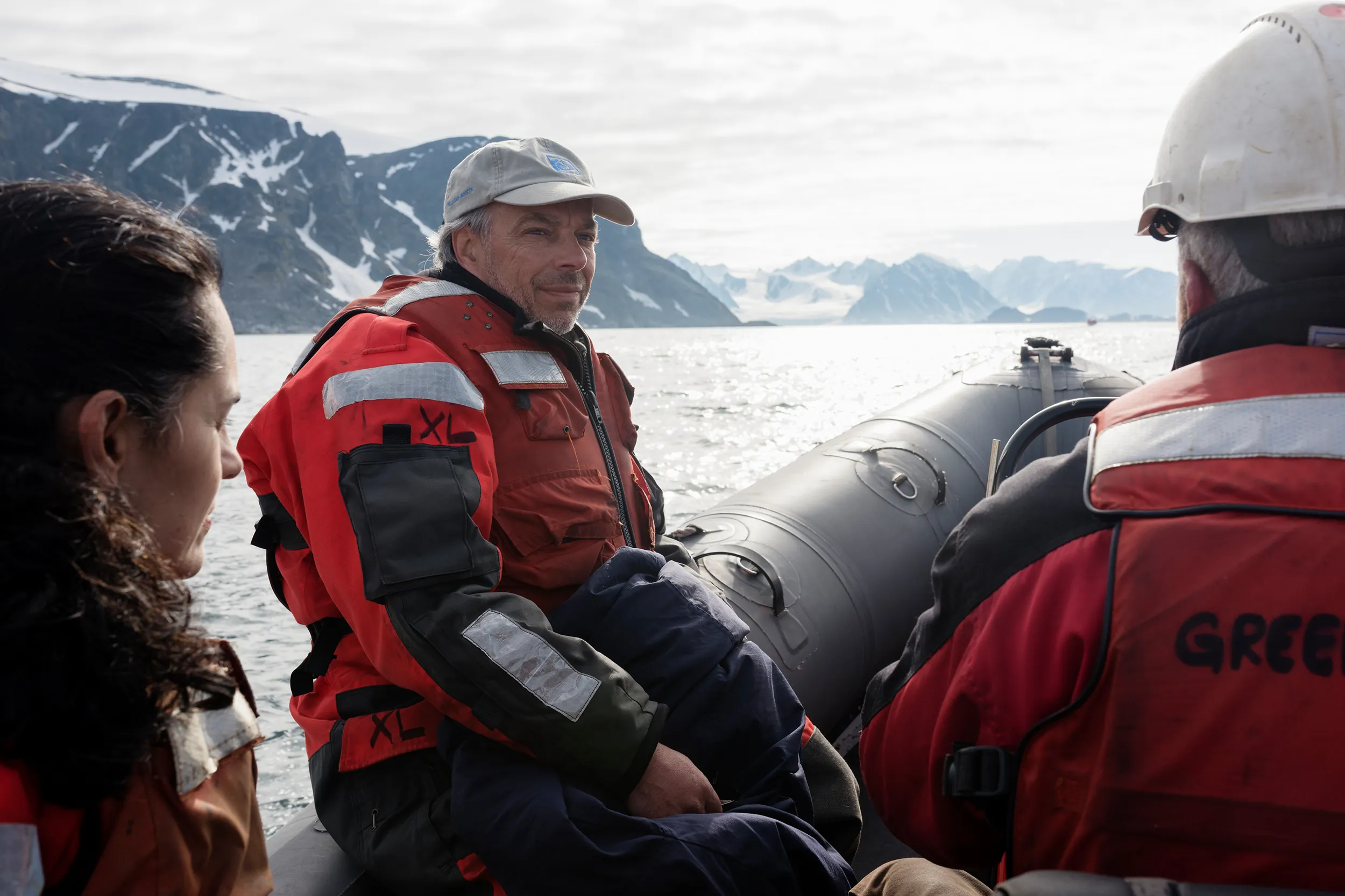 Conservationist Carl Safina sits in an raft