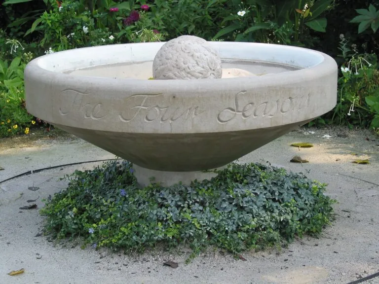 The Four Seasons pedestal and ball sculpture by Amy Brier