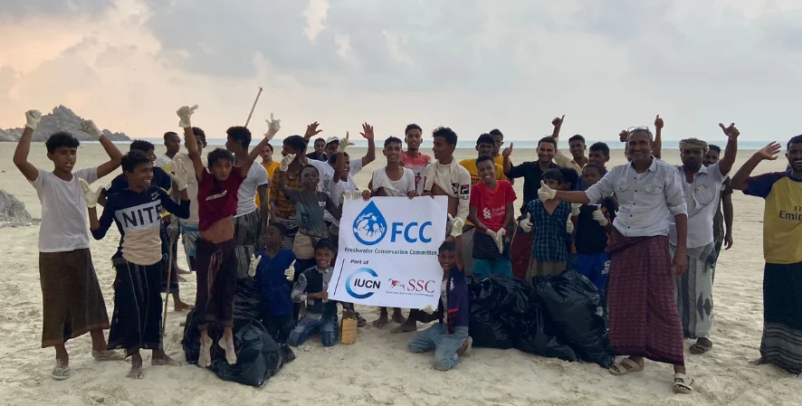 group giving thumbs up on Socotra beach