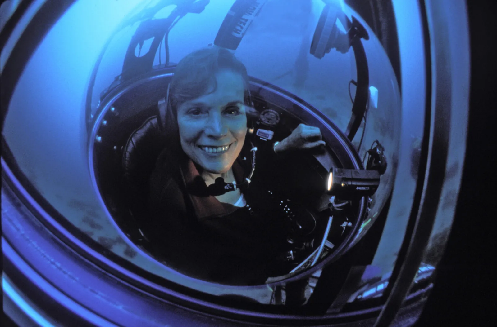 Dr. Sylvia Earle sits on a tiny one person submersible called the Deep Worker.
