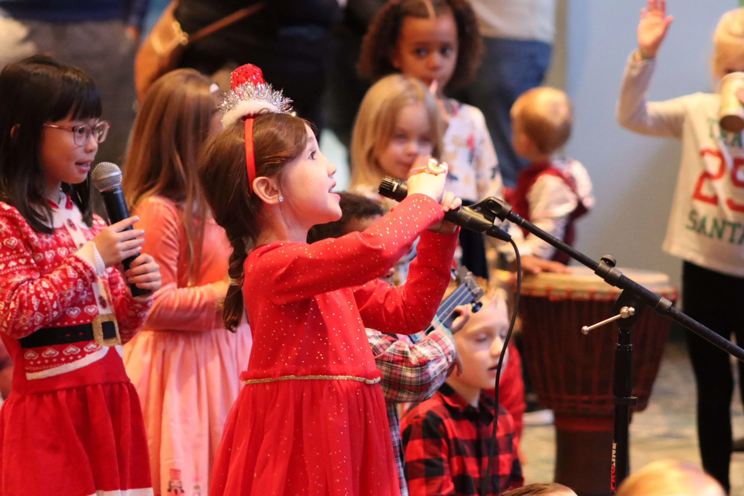 little girls with microphone singing