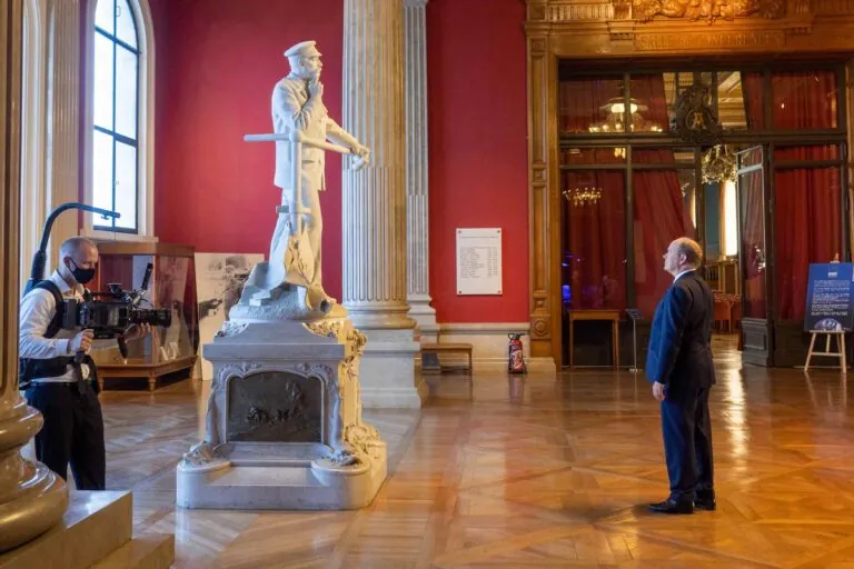 Prince Albert looking at statue