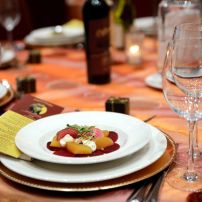 elegant food on a white plate at formal event