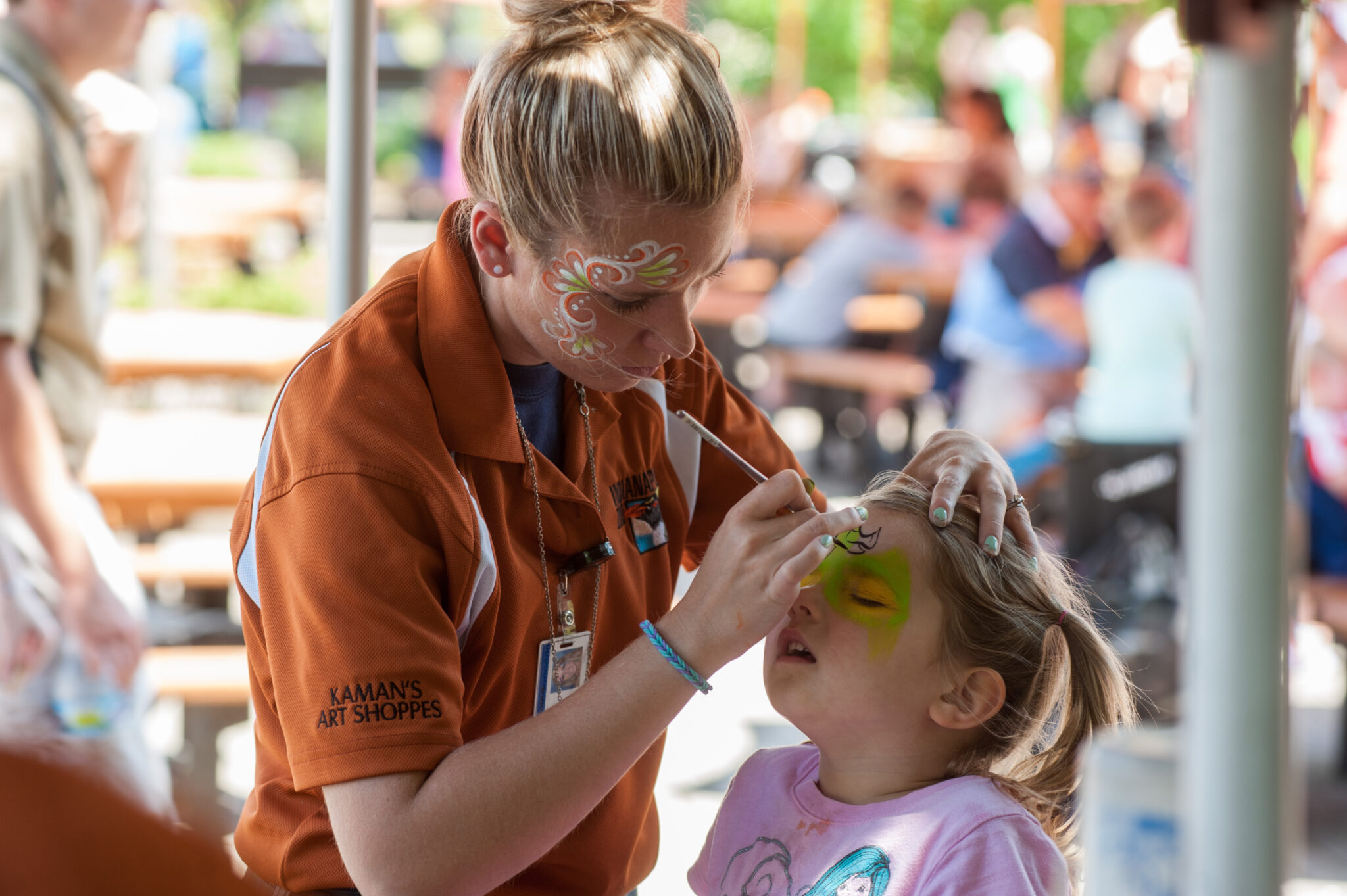 artist painting girls face