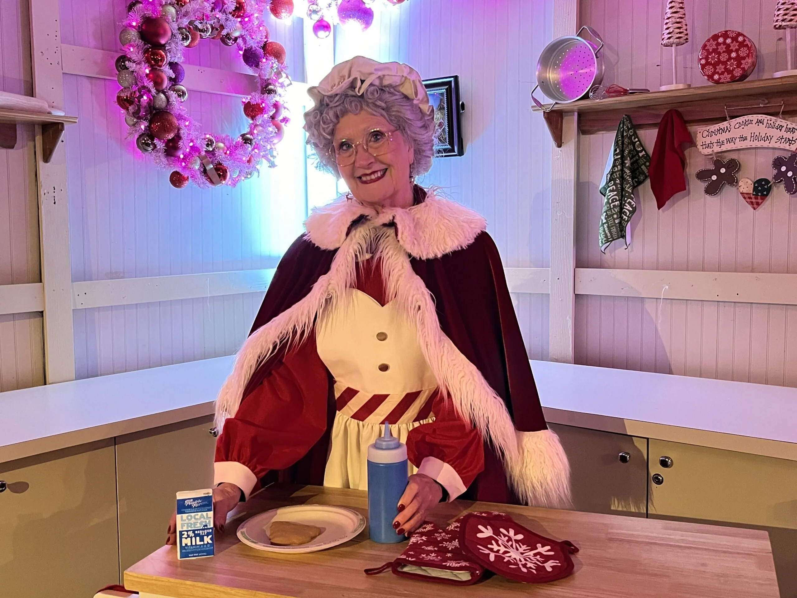 photo of Mrs. Claus with cookies and milk