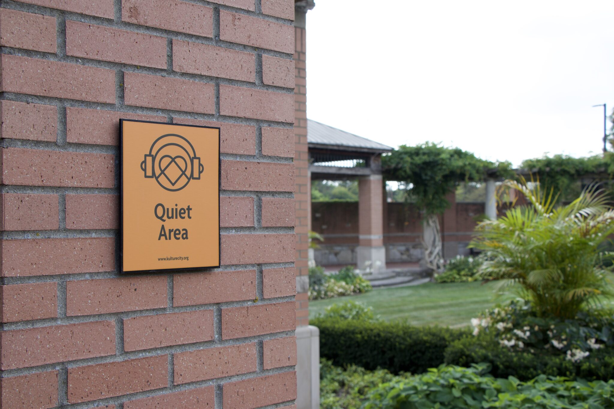 Kulture City Quiet Area Sign on brick wall