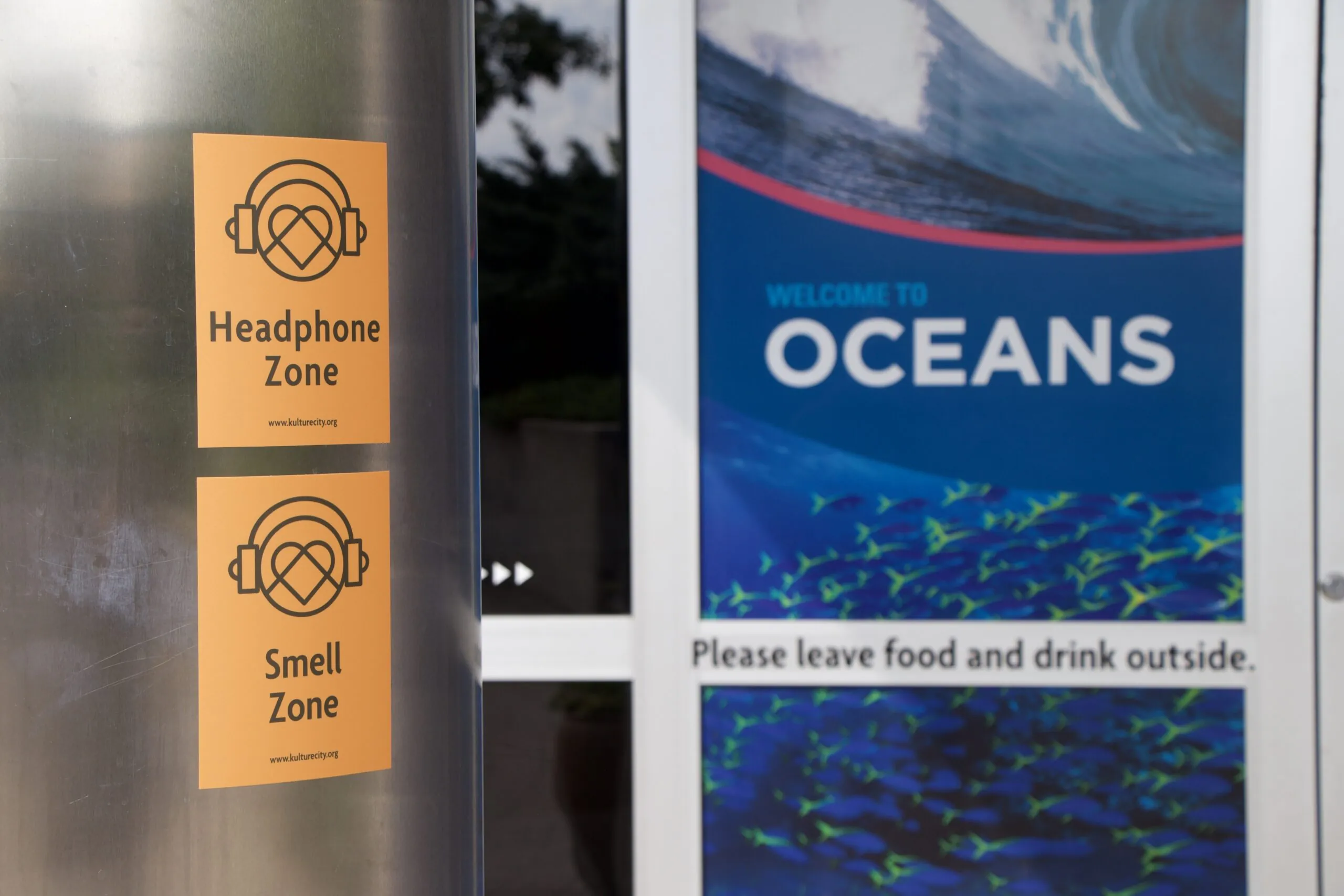 Kulture City headphone and smell zone stickers at Indy Zoo