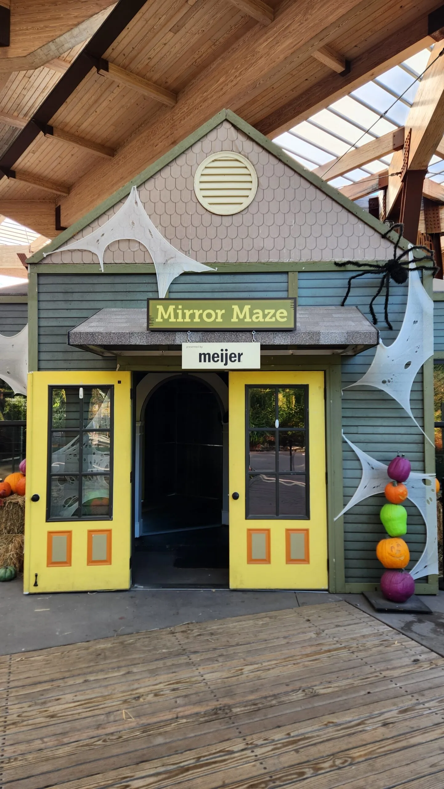 mirror maze with sponsor sign