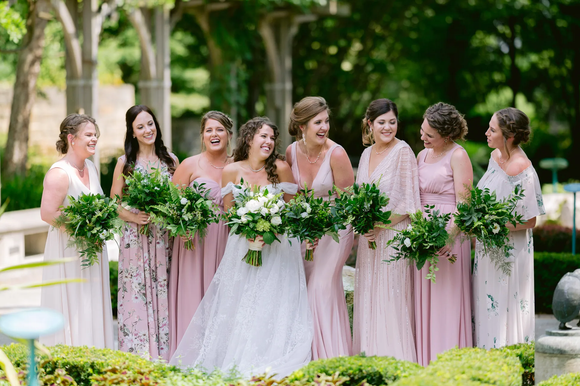 bride and bridesmaids in white river gardens