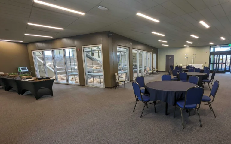 room setup for private event with tables and catering