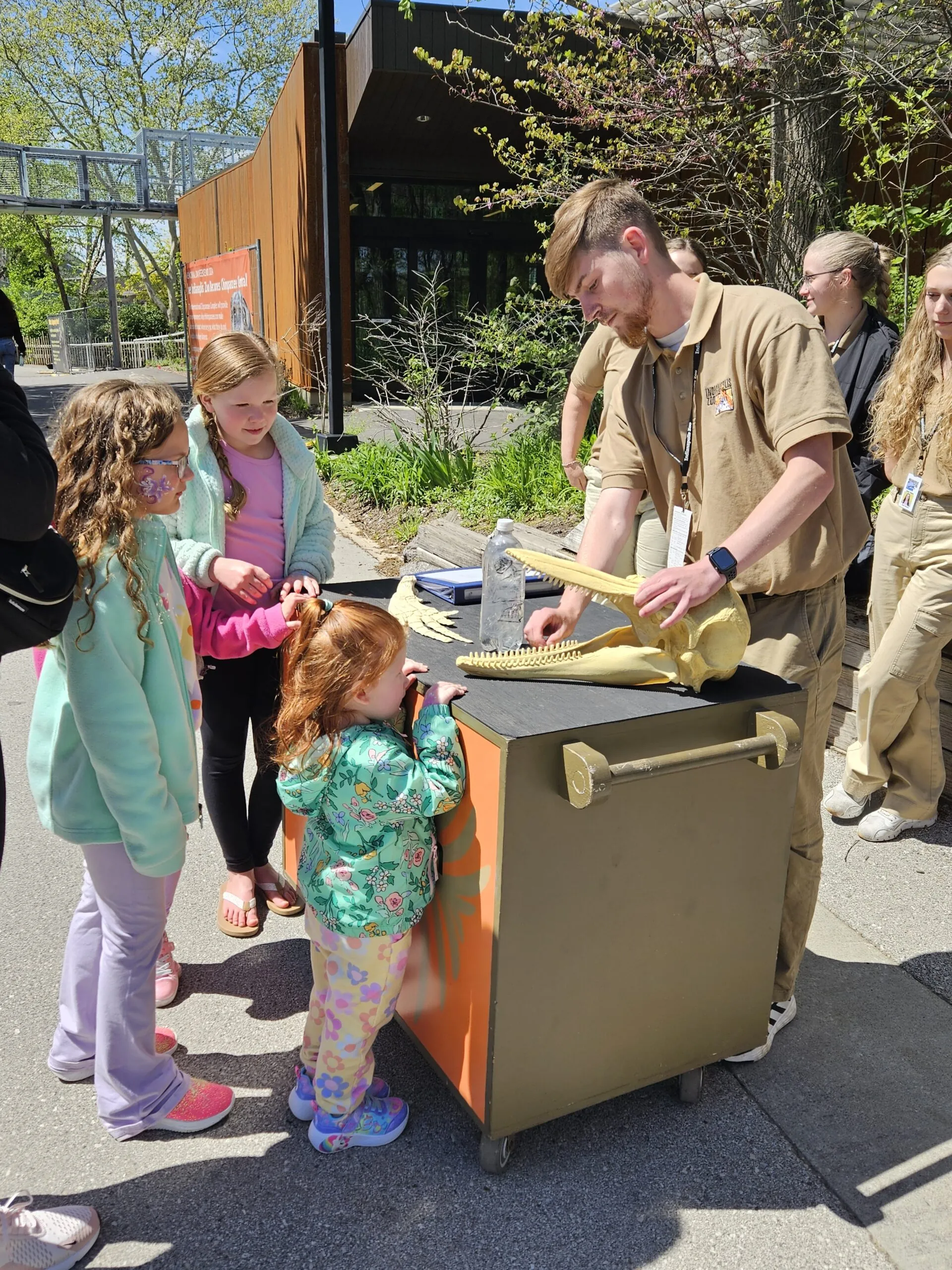 zoo volunteer with kids