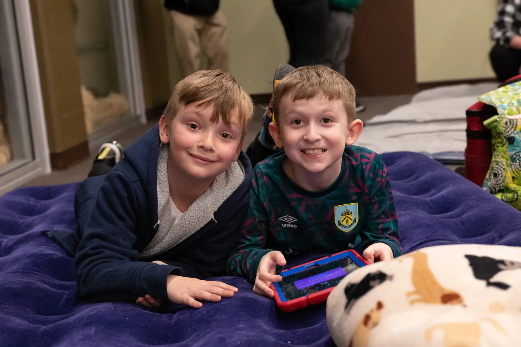 Boys on inflatable mattress