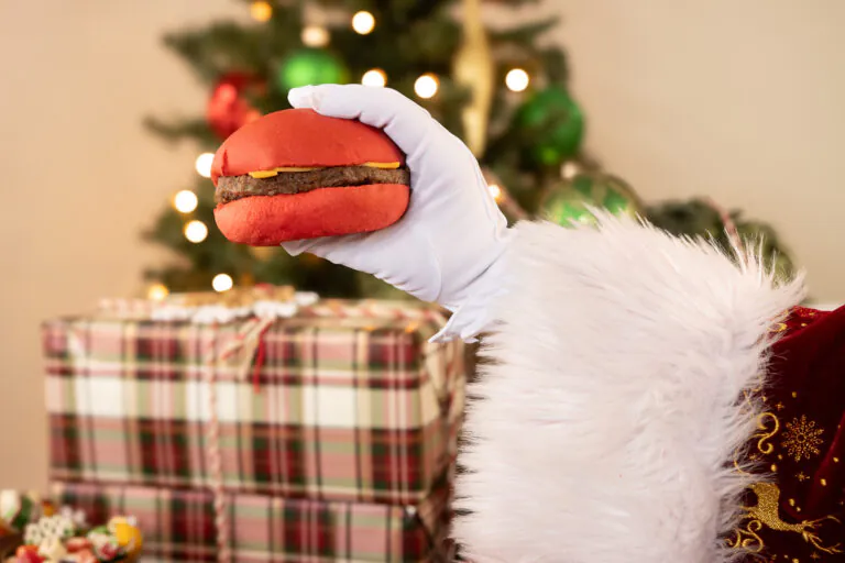 santa holding red cheeseburger